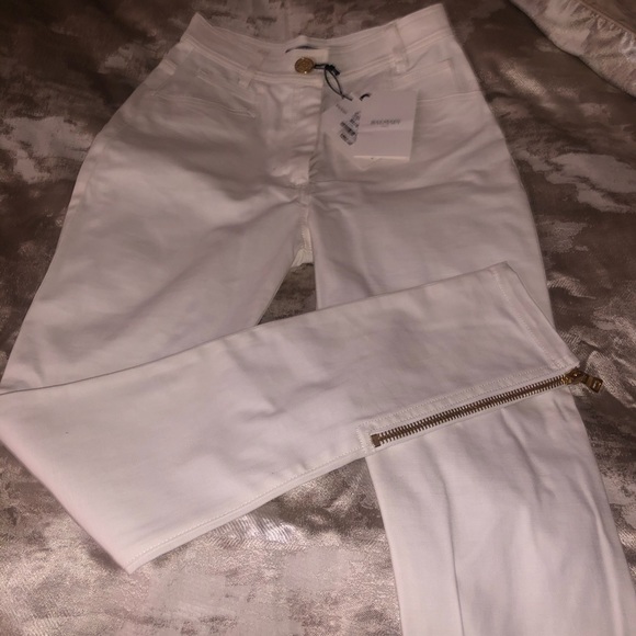 with gold buttons and zipper on the sides, - Picture 3 of 8